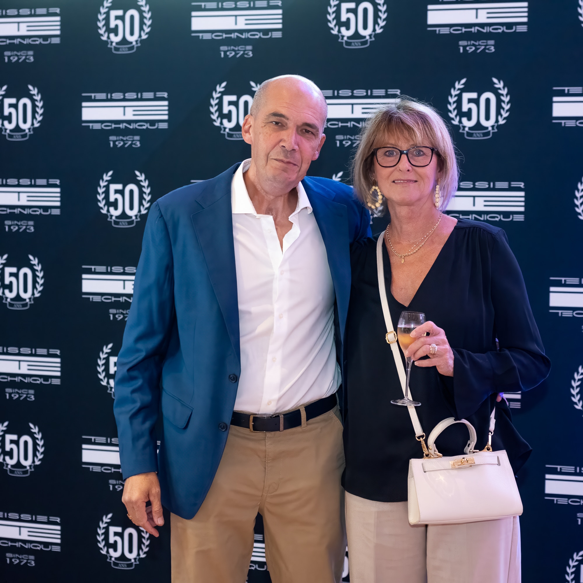 Invités au photocall d’un séminaire anniversaire d’entreprise, photographe événementiel Annecy